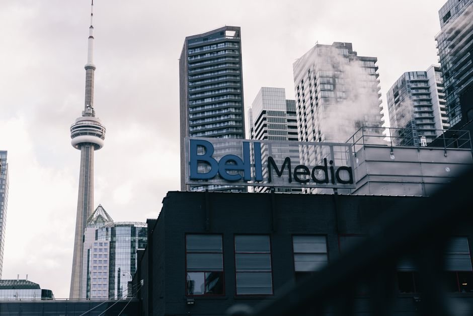 Asian and European Film Producers to Explore Co-Production at Tokyo Market Toronto cityscape with CN Tower and Bell Media building, a blend of modern architecture.