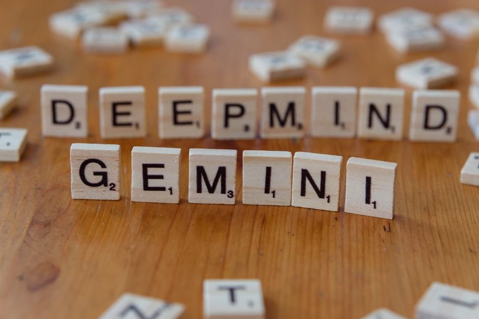 Google DeepMind Unveils EmbeddingGemma 2, a Lightweight Multimodal AI Model for On-Device Processing Wooden Scrabble tiles spelling 'Deepmind' and 'Gemini' on a wooden surface, a concept of AI and games.