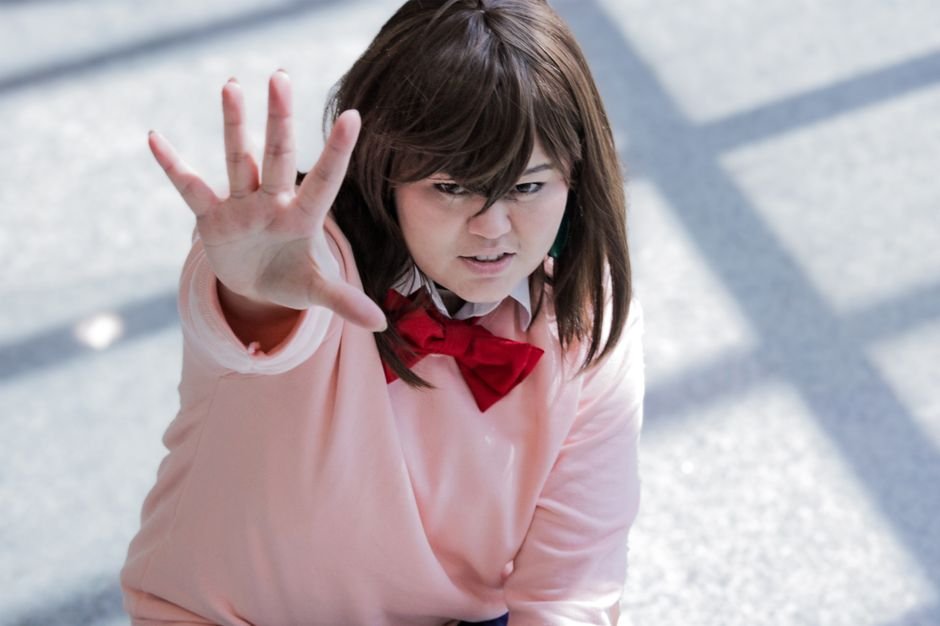 Japan’s Prime Minister Pledges Robust Support for Domestic Film Industry at Tokyo Film Festival Opening Young adult in anime-inspired cosplay, energetically posing indoors.
